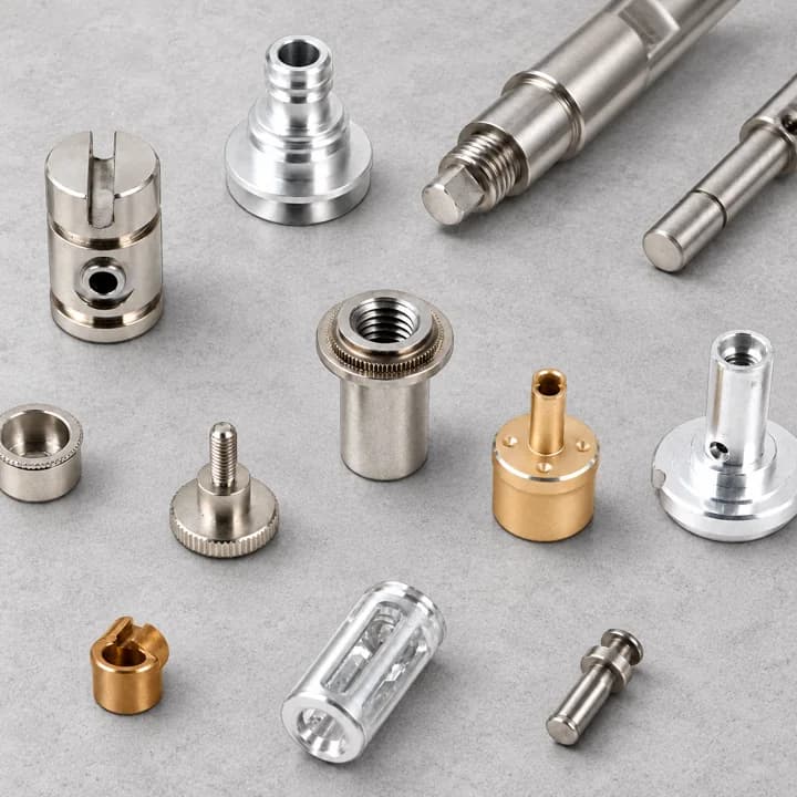 Small Turned Components on a textured concrete background